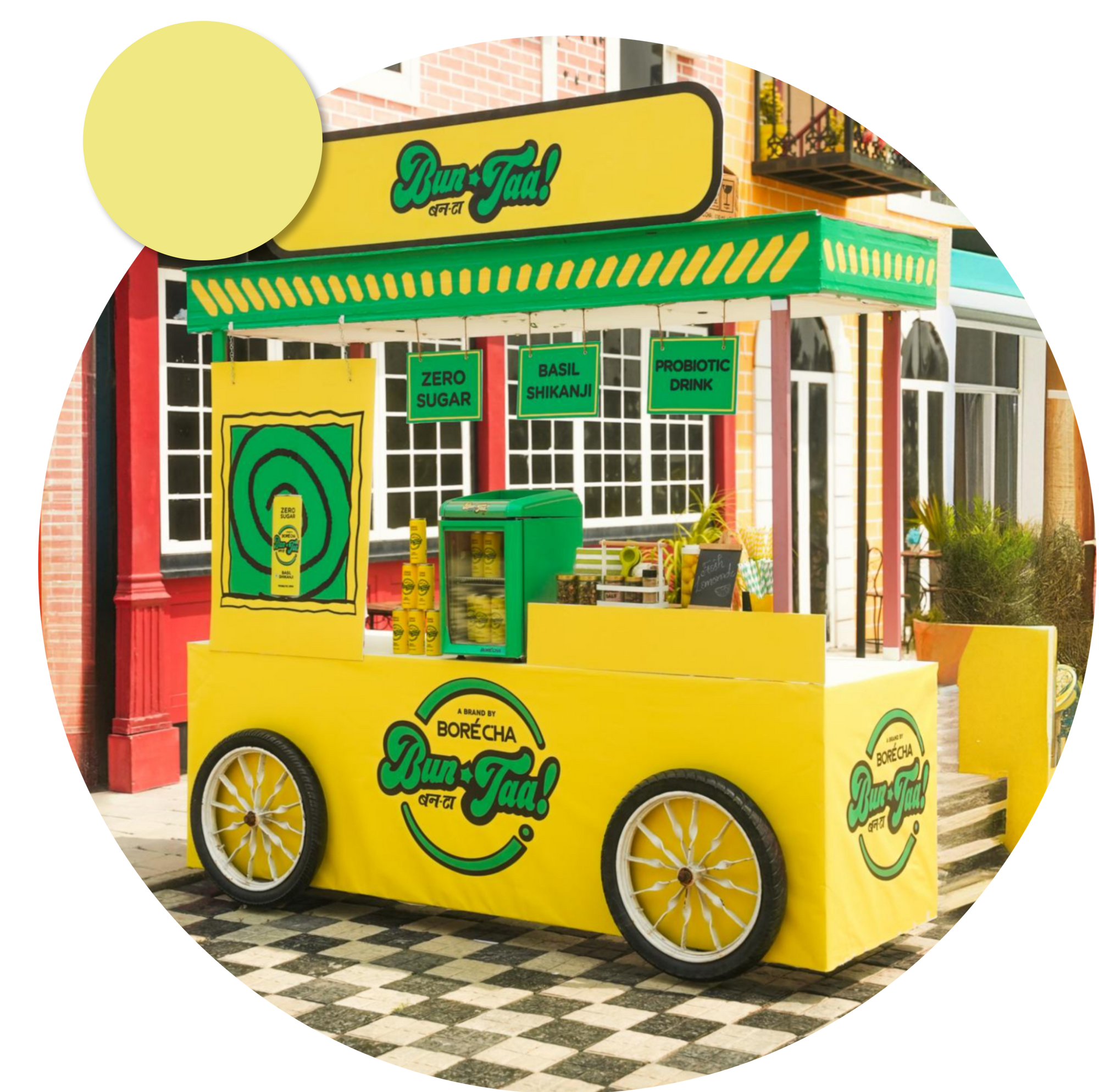 The bright yellow and green Bun-Taa soda cart